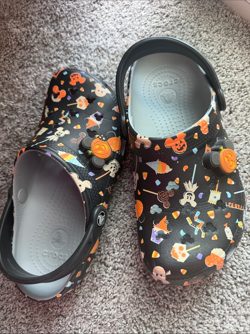 CROCS women’s disney Black Halloween Print Clogs with Orange Accents